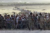 Amnesty International обвинила Турцию в незаконной депортации сирийских беженцев