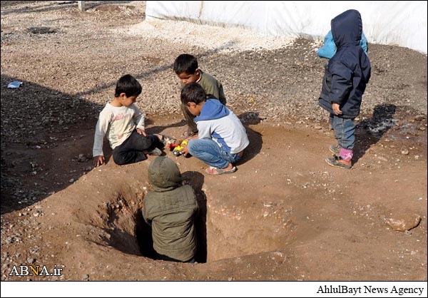 Photos: Kobani Refugees Under Harsh Conditions