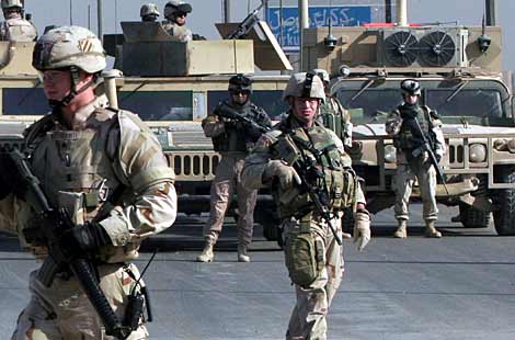 اميركا تحتل العراق من جديد بذريعة قتال عصابات ” داعش”