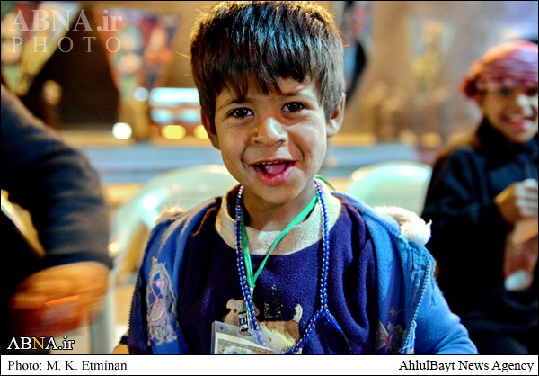 Photos: Children Serving Pilgrims of Imam Hussain (AS)