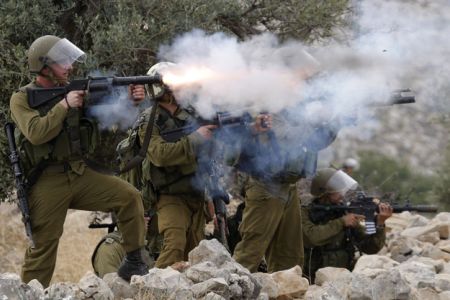 Israeli soldiers target Palestine school with tear gas