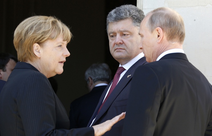 Путин Меркел, Олланд вә Порошенко илә Украjнадакы вәзиjjәти мүзакирә едиб
