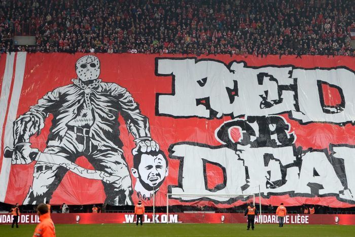 Belgian Football Fans Cause Outrage with Banner of Beheaded Man Alluding to ISIS + Pic