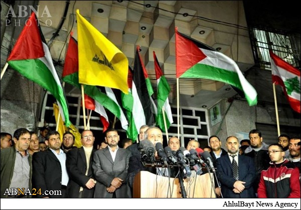 Photos: Gaza Celebrates Hezbollah Missile Attacks on Israel