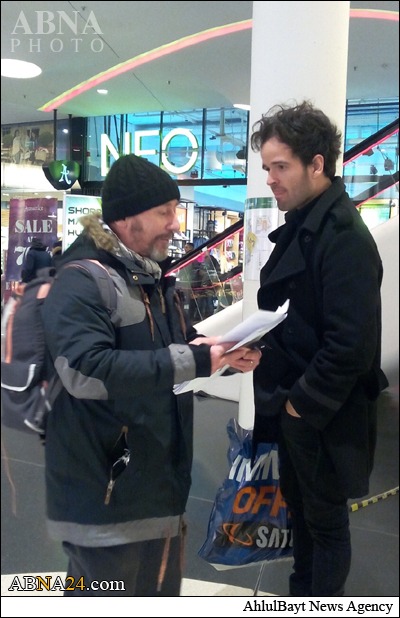Photos: Leader's message distributed among Frankfurt youth