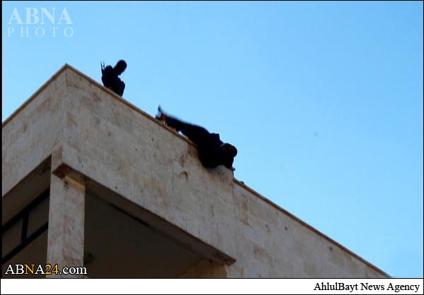 ISIS Throw Man from Roof Then Stone his Corpse in Syria + Photos
