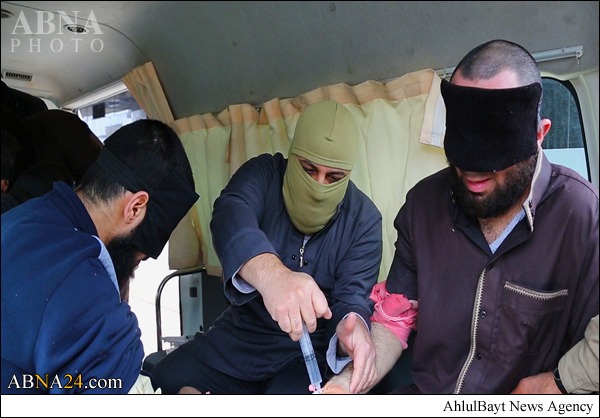 Photos: ISIS Amputates Hands of 2 in Public in Iraq
