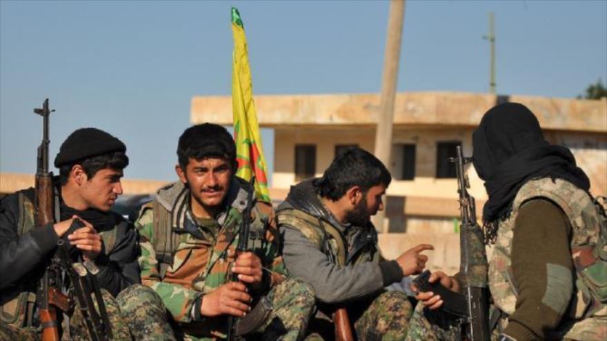 Forces kurdes repoussent attaquer EIIL une ville syrienne