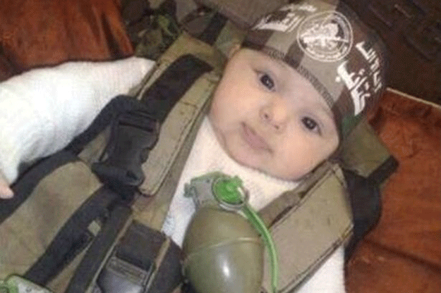 The so-called Islamic State dresses baby as suicide bomber in publicity stunt