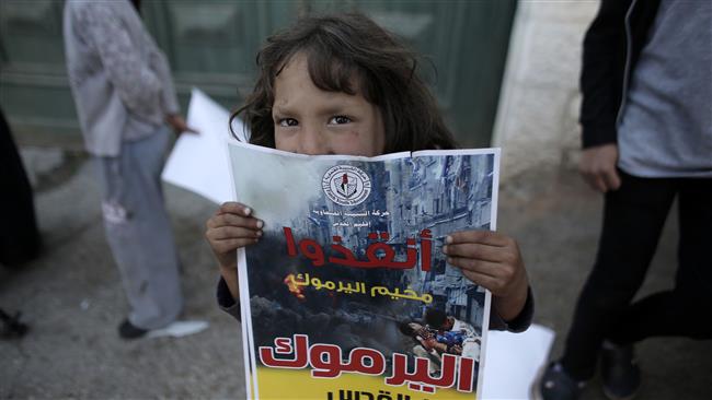 Palestinian lawmaker slams Arab silence on Yarmouk camp in Syria
