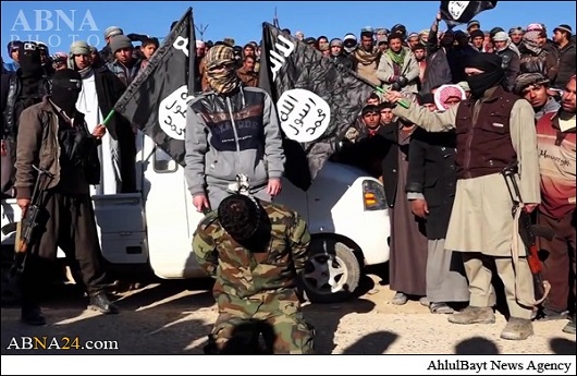 IŞİD Irak Hizbullah Komandosunun Başını Kesti / Foto (+18)