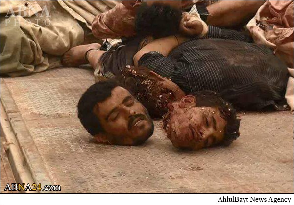 بالصور/ ذبح 14 جندياً يمنياً بواسطة داعش بصورة بشعة (18+)