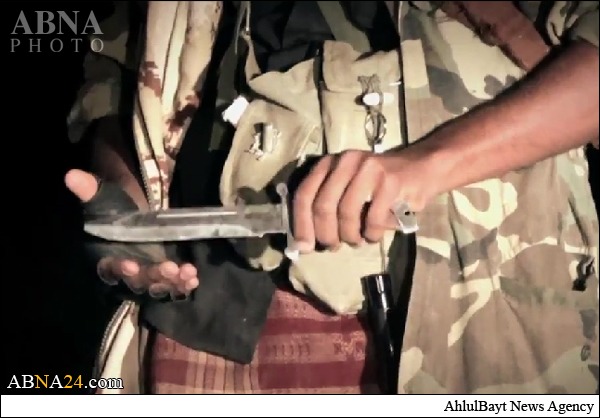 بالصور/ تنظيم "داعش" يعدم ١٥ جنديا يمنيا ٤ منهم بقطع الرأس في محافظة شبوة (18+)