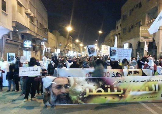 تظاهرات بالعوامية تحذر من مغبة اعدام الشيخ النمر