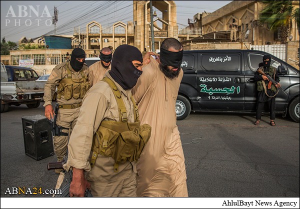 Photos: ISIS executes 2 Iraqi men