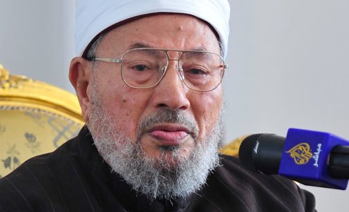 القرضاوي منتقداً السلطات الألمانية "هل تستعيد ألمانيا نازيتها بإعتقالها مذيع الجزيرة"