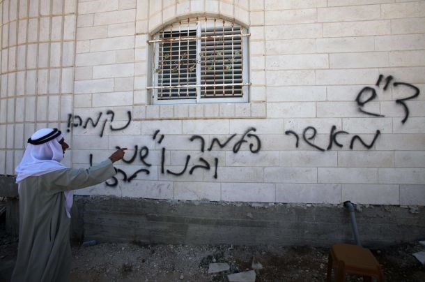 Israeli extremist settlers spray racist slogans on Jerusalemite mosque
