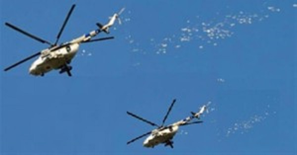وزارة الدفاع العراقية تلقي منشورات على اهالي الموصل تمهيداً لتحريرها+ صورة