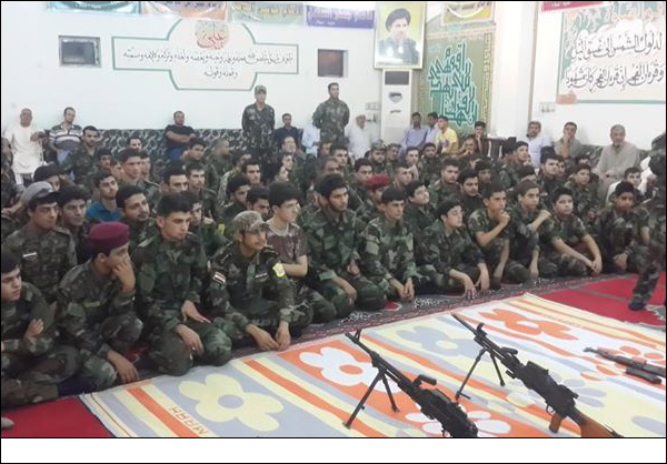 تقرير مصور / حضور مقاتلي الحشد الشعبي في حسينية أهل البيت (ع) في كركوك