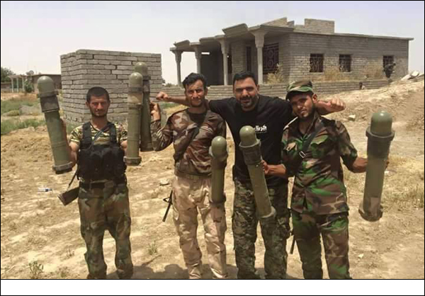 تقرير مصور/ الحشد الشعبي يقتل انتحاريين ويضبط صواريخ حرارية أمريكية الصنع لداعش في بيجي