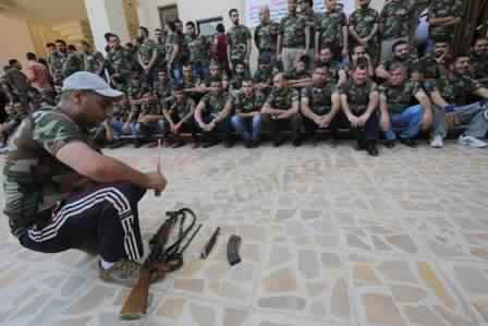Iraqi Students, university professors are training on the use of weapons + Pics