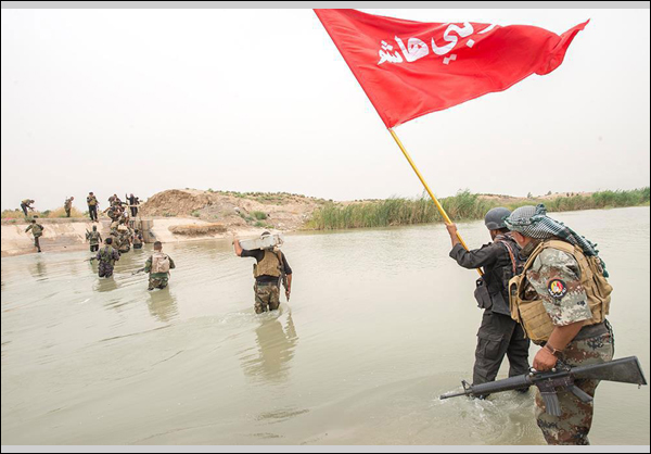 شابٌّ عراقي يتبرّع بتكاليف زواجه كاملة لقوّات الحشد الشعبيّ