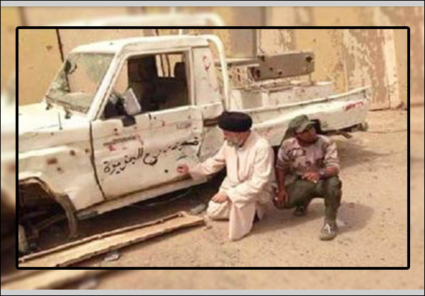 الحشد الشعبي يعثر على عجلات مكتوب عليها "درع الجزيرة" في بيجي