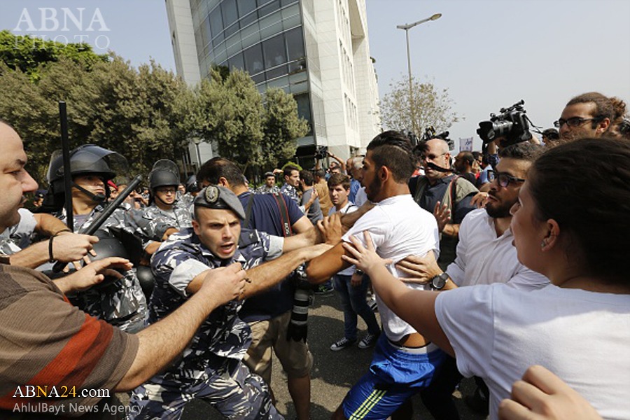 Photos: Lebanon police clash with protesters again over trash crisis