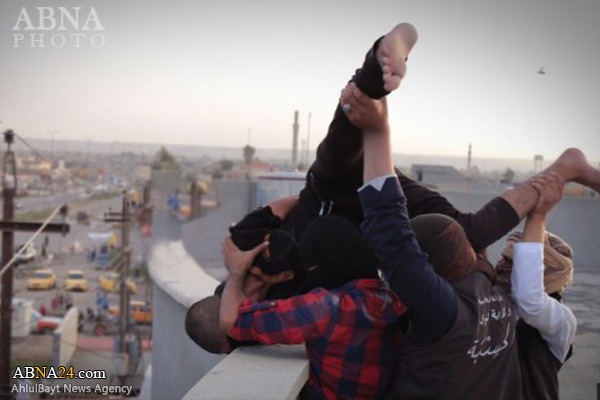 Photos: ISIS throws two Iraqi men off a roof