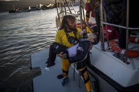 Child drowns, another missing in refugee boat sinking near Greece