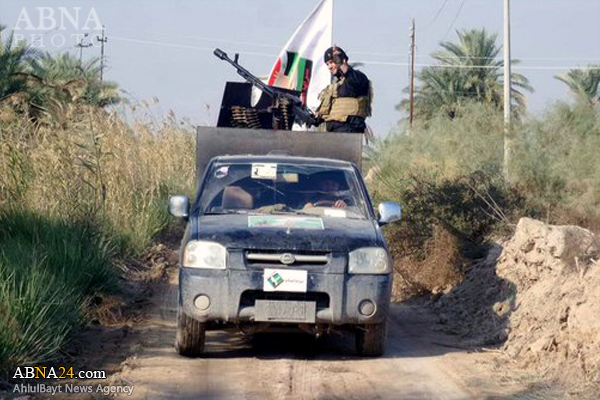 تقرير مصور / الحشد الشعبي الوطني يحرس ارواح زوار الأربعينية للإمام الحسين (ع)