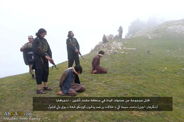 Photos: ISIS Fighters Brutally Execute Afghan Men