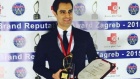 Iranischer Zahnarzt mit dem Preis "The European Business Management" ausgezeichnet