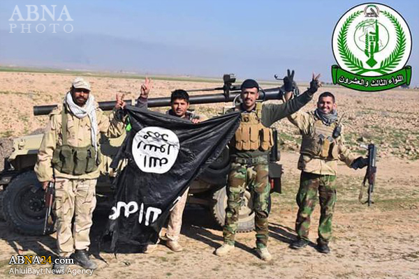 تقرير مصور / الحشد الشعبي يكبد داعش خسائر فادحة بالارواح