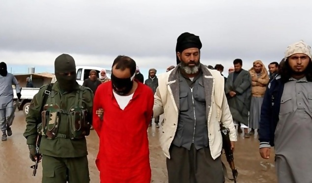 ISIS executes two men in Palmyra on charges of spying for Syrian army