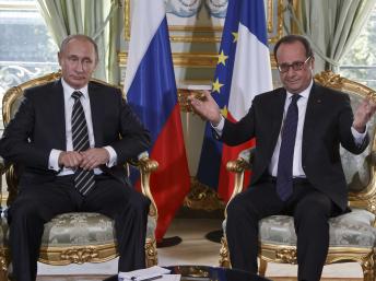 France President: Russia must stop supporting Syrian President Assad
