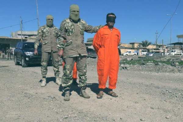 Graphics: ISIS beheads two Iraqi men on charge of spying for army