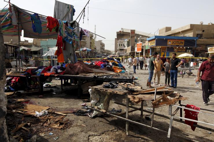 Twin bombing attacks in Baghdad market kill at least 24