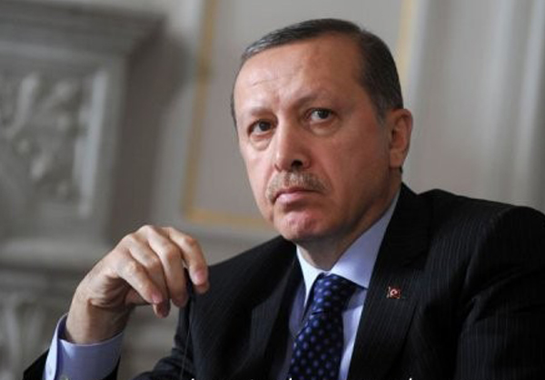 صحفي تركي مفرج عنه يتحدى أردوغان ويقول "الافراج هزيمة له"
