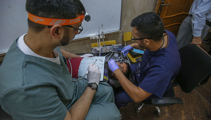 Fifty-five foreign doctors arrive to Karbala to treat orphans for free