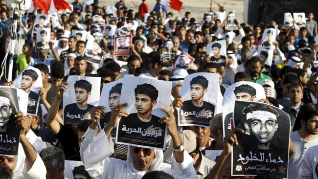 Bahrain regime attack protesters after teenage's funeral