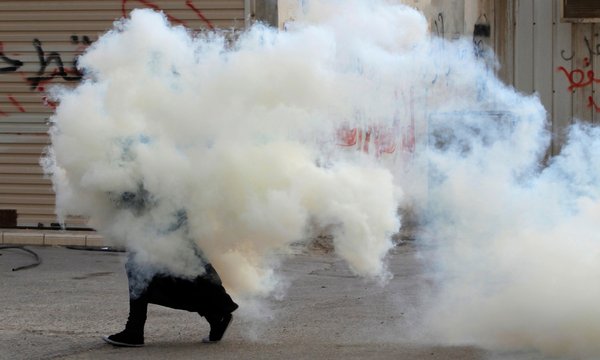 Bahrain Police Fire Tear Gas Grenade on Women and Children inside a House