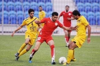 Bahraini Shiite football player split between bitterness of deportation and staying in prison for life