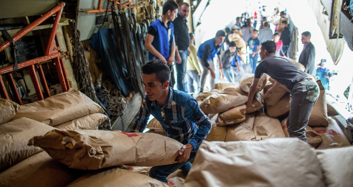 Russian Lawmakers Deliver Over 20 Tonnes of Humanitarian Aid to Syria