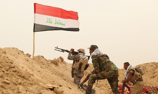 الحشد الشعبي يغنم أسلحة بعد صده هجوم لداعش في جبال مكحول بصلاح الدين + فيديو