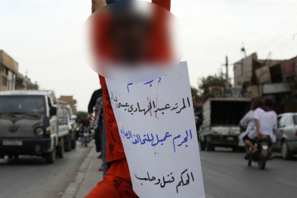 latest version of Daesh execution: ISIS stabs man in heart, shoots in head, crucified him over ‘espionage’ / Photos