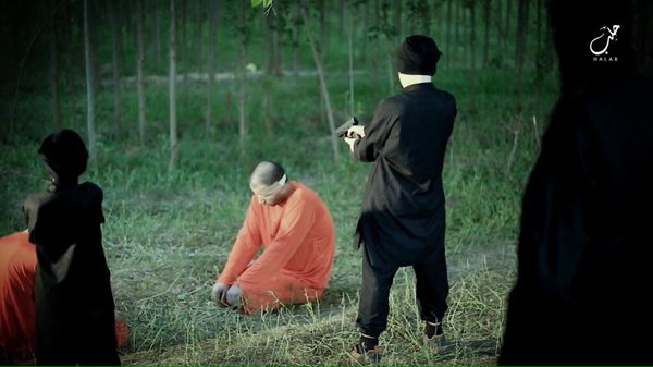 Two ISIS French brothers execute 2 men in Syria's Aleppo  / Photos