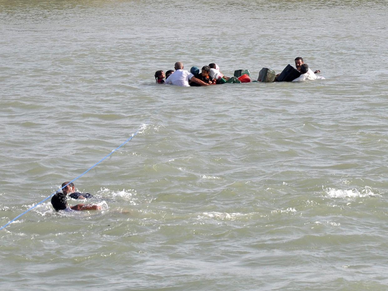 Life worse than hell in Iraq's Fallujah; hunger, death and shelling; Father watches as wife, children drown in river