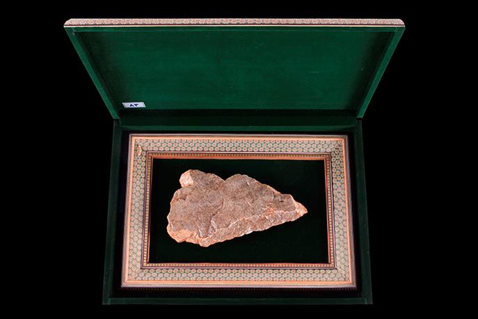 Displaying two unique Quranic work gifted by Imam Khamenei to Astan Quds's museum