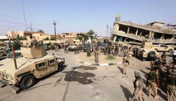 فيديو/ مجاهدو الحشد الشعبي يفطرون في احد شوارع الفلوجة